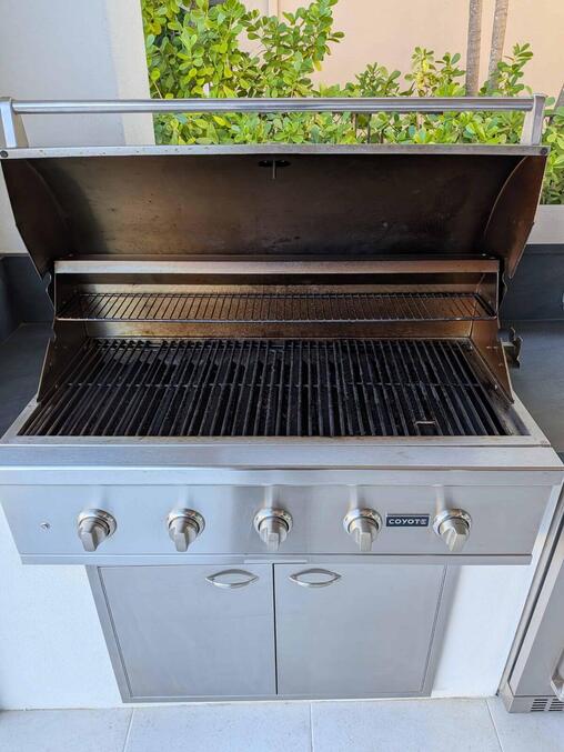 A clean and well-cared-for gas grill, ready for the next cookout